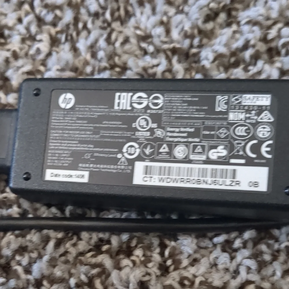 HP Black Laptop Power Adapter with Attached Cord